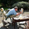 Architect and author Christopher Alexander, painting at his home in England